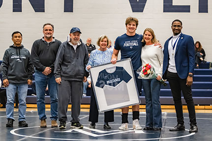 A large group of people posing for a photo. Links to What to Give